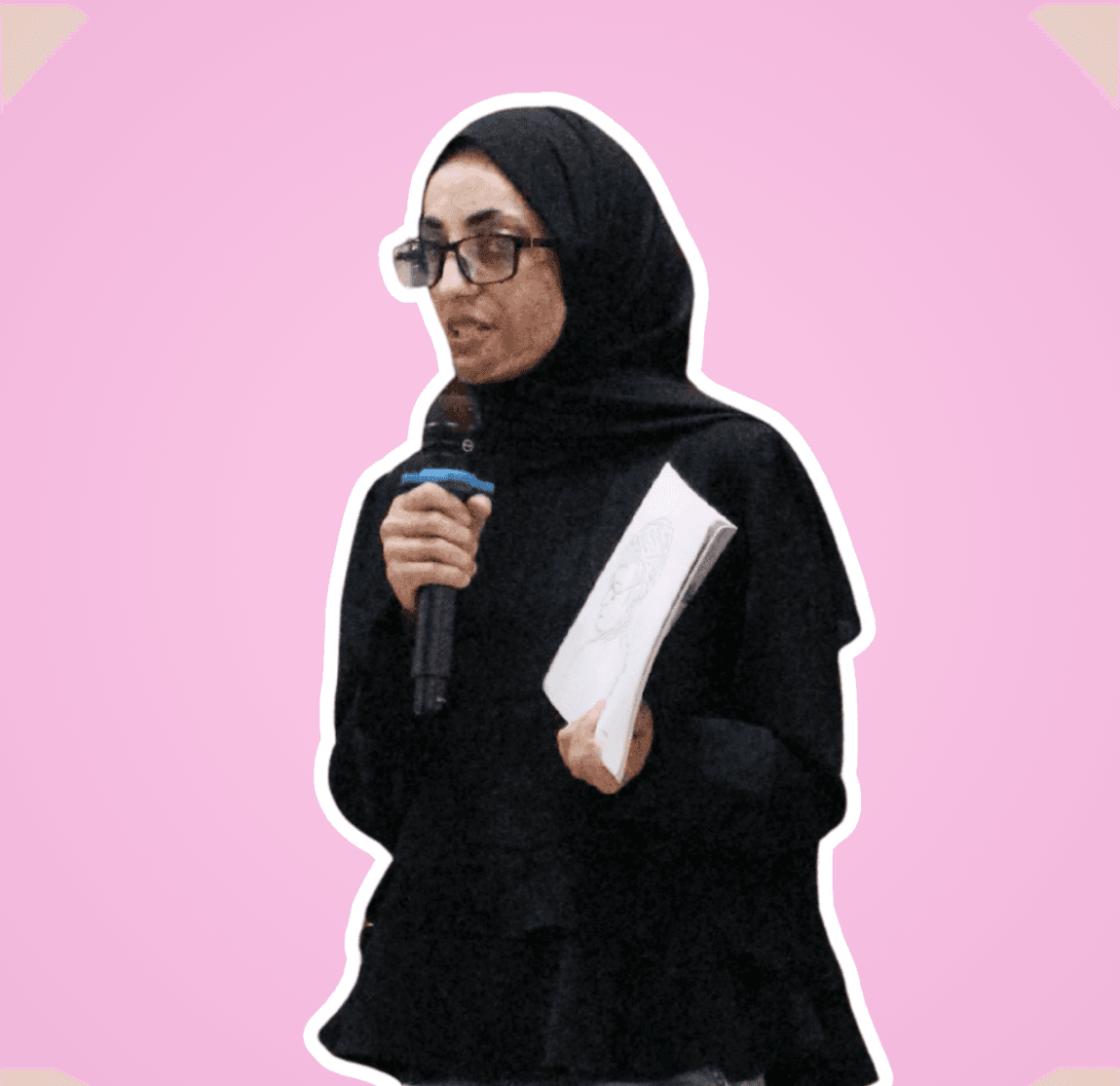 Woman speaking into a microphone against a pink background